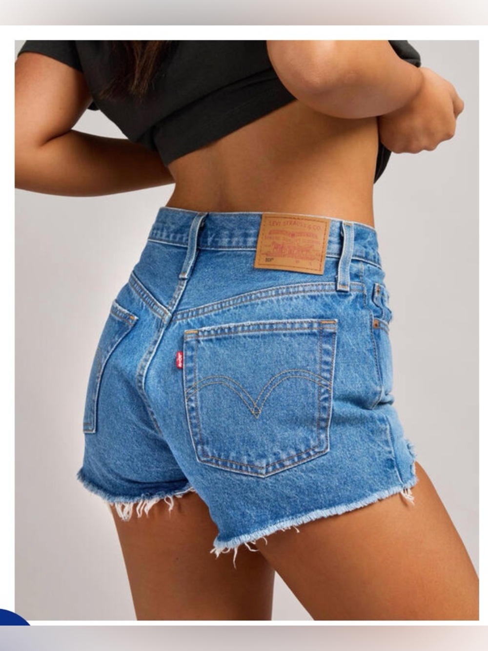 Levi's Light Blue Distressed High-Rise Jean Shorts - Picture 2 of 13